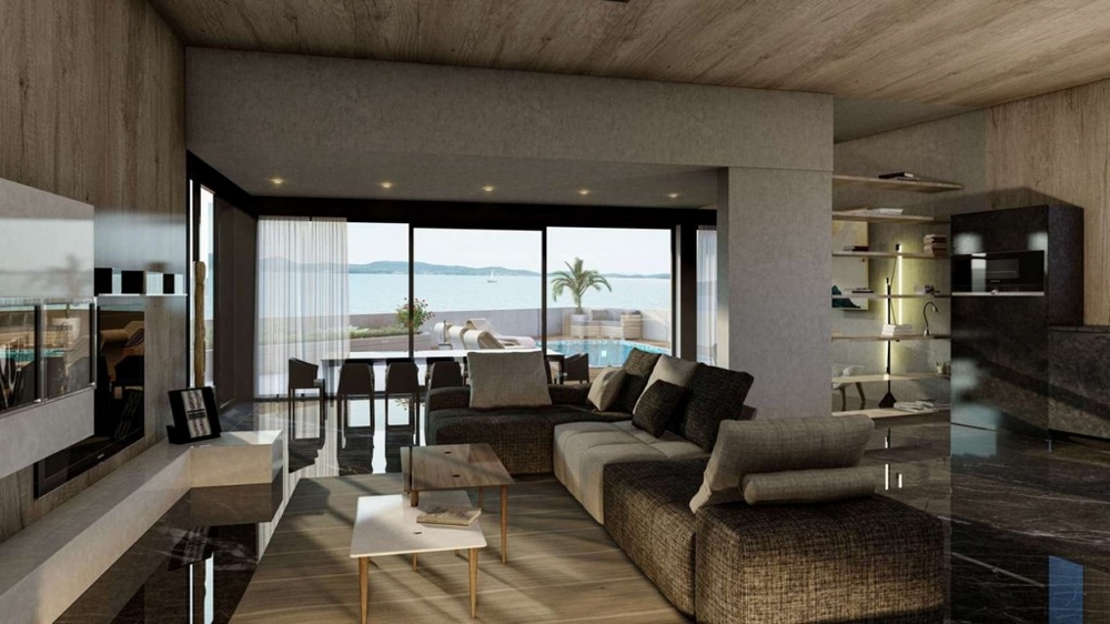 Tágas terasz kilátással a medencére és a tengerre