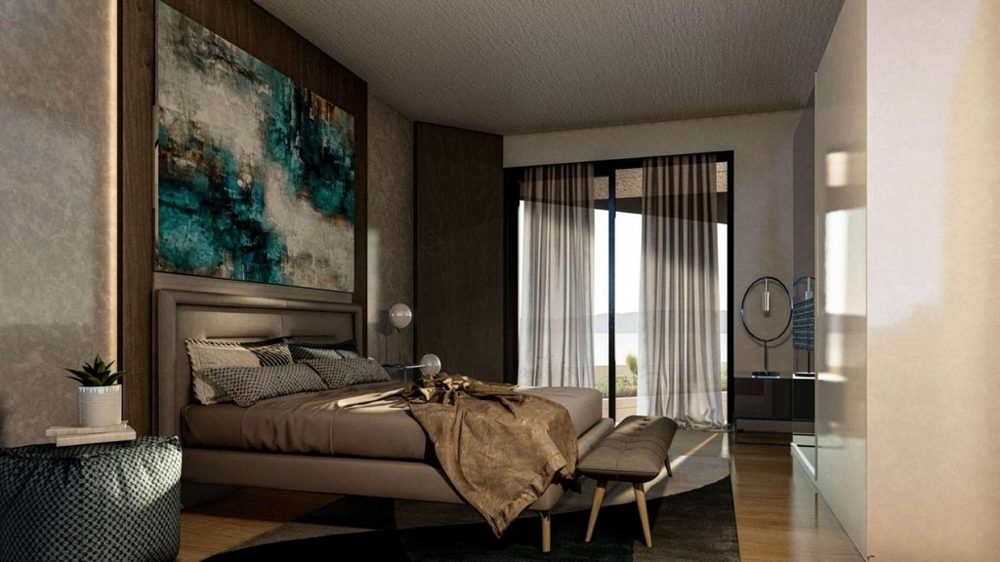 Hálószoba kijárattal a teraszra és kilátással a tengerre