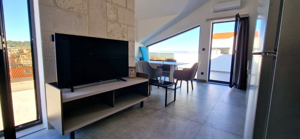 A horvátországi Brac szigeten található A3058-as ingatlan légkondicionált nappalija - Panorama Scouting.