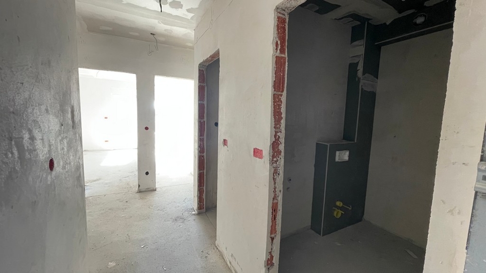 Folyosó, ahonnan elérhető a fürdőszoba és a nappali