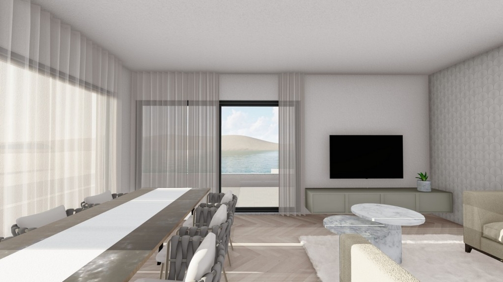 Modern nappali és étkező, közvetlen hozzáféréssel a teraszhoz és a tengerre néző kilátással
