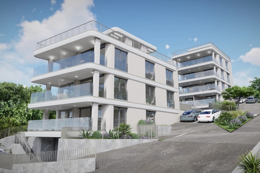 Lifttel és kültéri parkolóhellyel rendelkező bérház