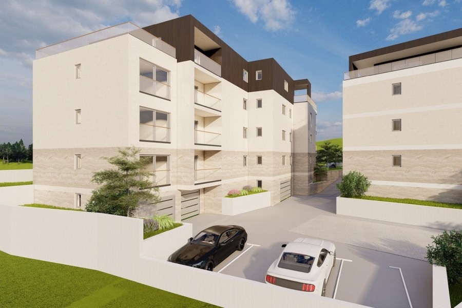 Látványterv: épületszárny udvarral és parkolóhelyekkel
