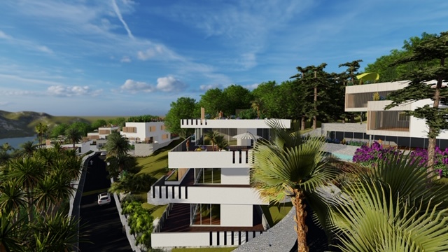 Kilátás a kertből a környező területre és az építési területen lévő többi villára.