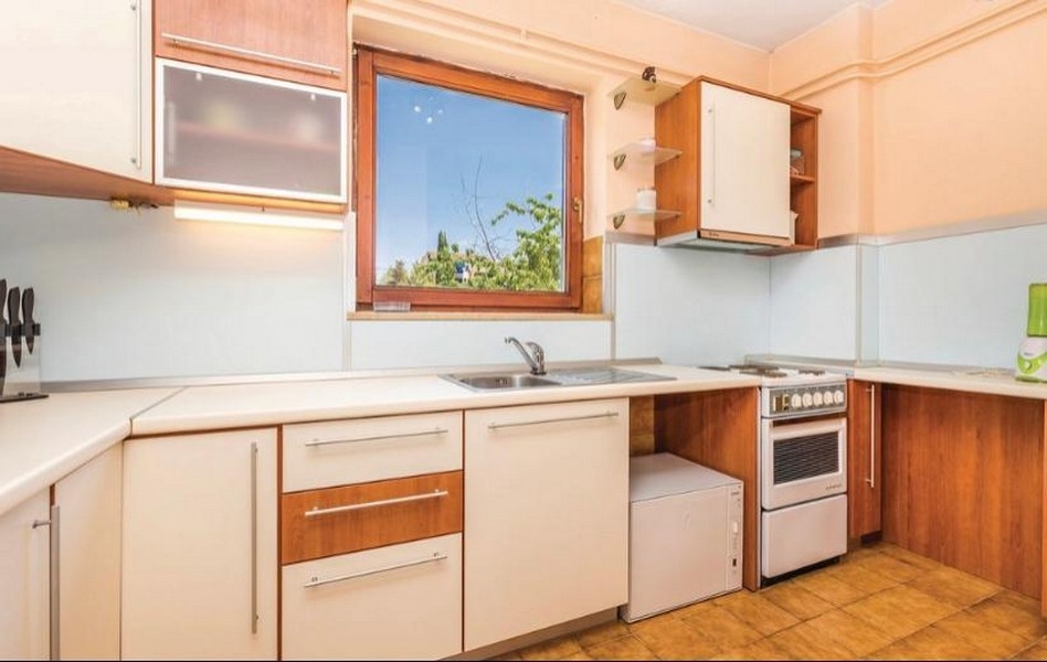 Lakóház parkosított kerttel