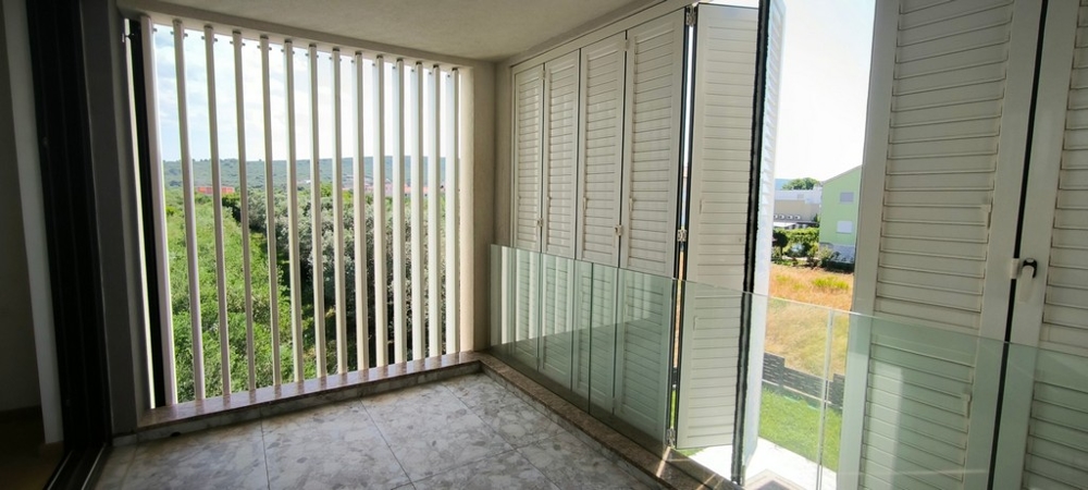 Napvédelemmel ellátott terasz