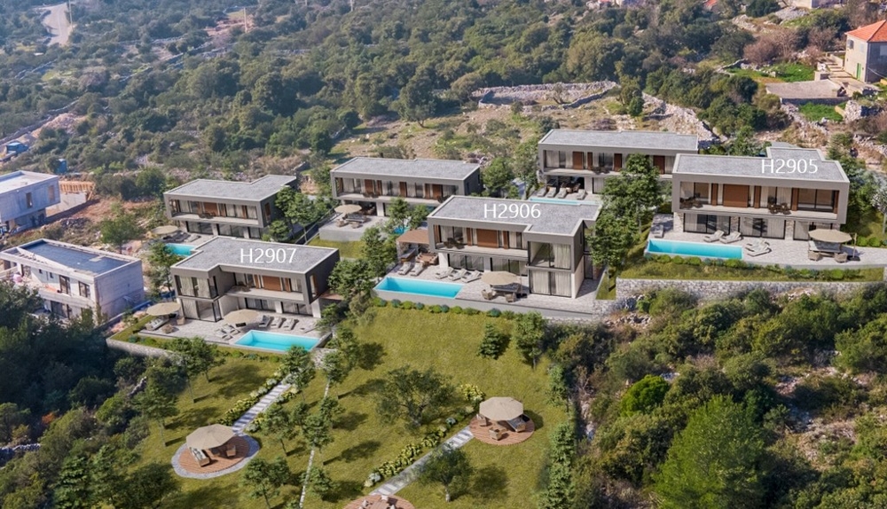 Több modern medencés villa légi felvétele Horvátországban eladó.