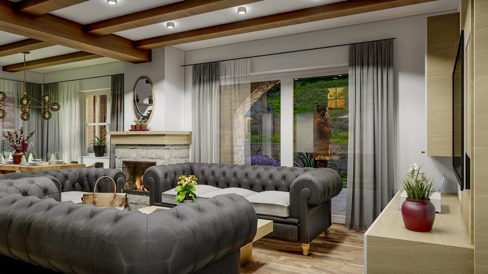 Egy mediterrán villa nappalija elegáns szürke kanapékkal és kertre néző kilátással Krk szigetére