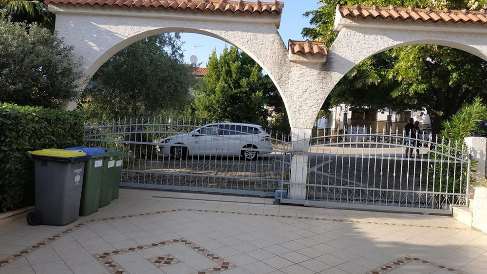 Íves bejárati kapu, ház Porecen, Horvátországban