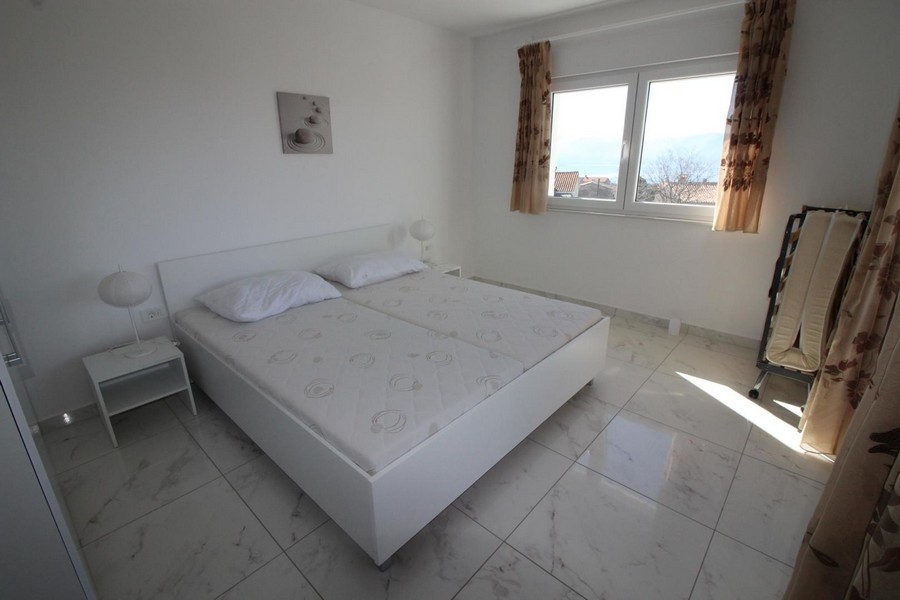 A 4 hálószoba egyike.