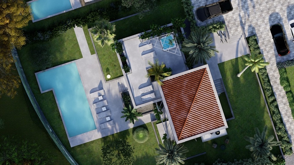 Légi kilátás a villára medencével és kerttel