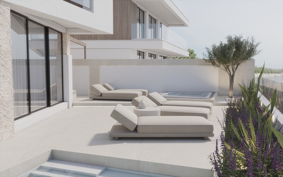 Terasz modern napozóágyakkal.