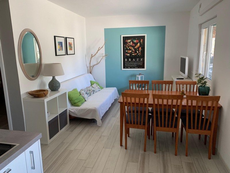 Nappali étkezővel az egyik apartmanban, a H4090 Povlja ház