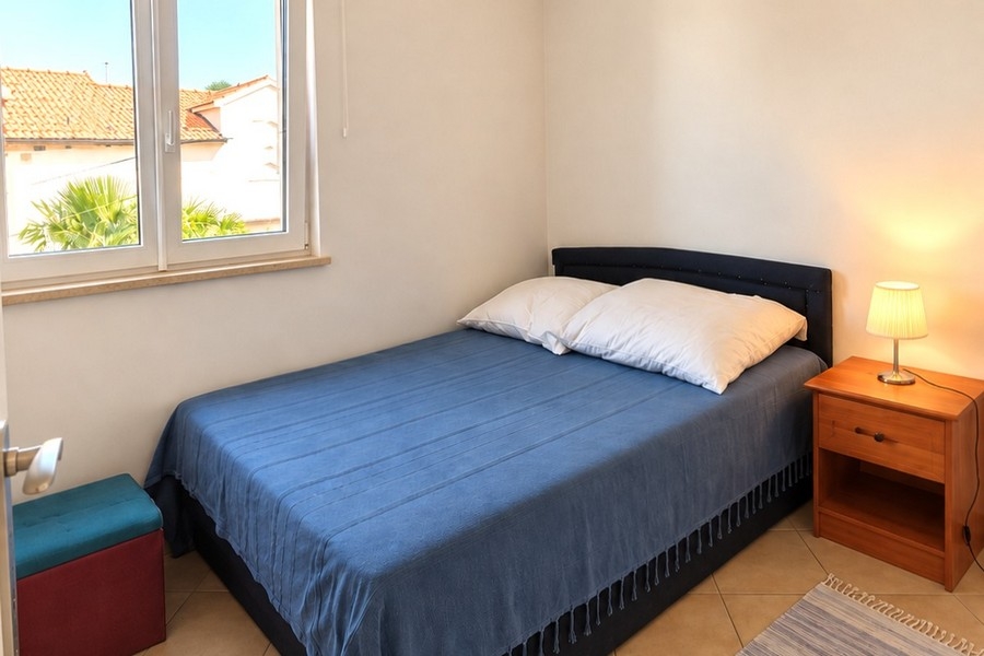 Kétágyas hálószoba az egyik apartmanban