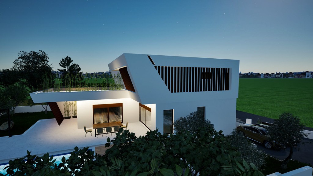 Villa esti képe megvilágított teraszal