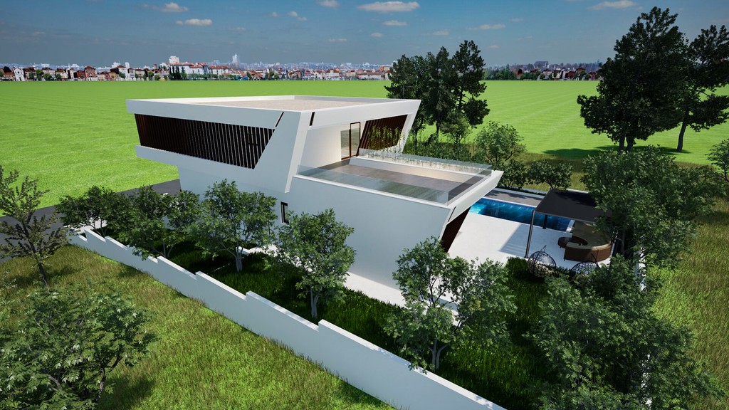 A villa oldalnézete medencével és kerttel