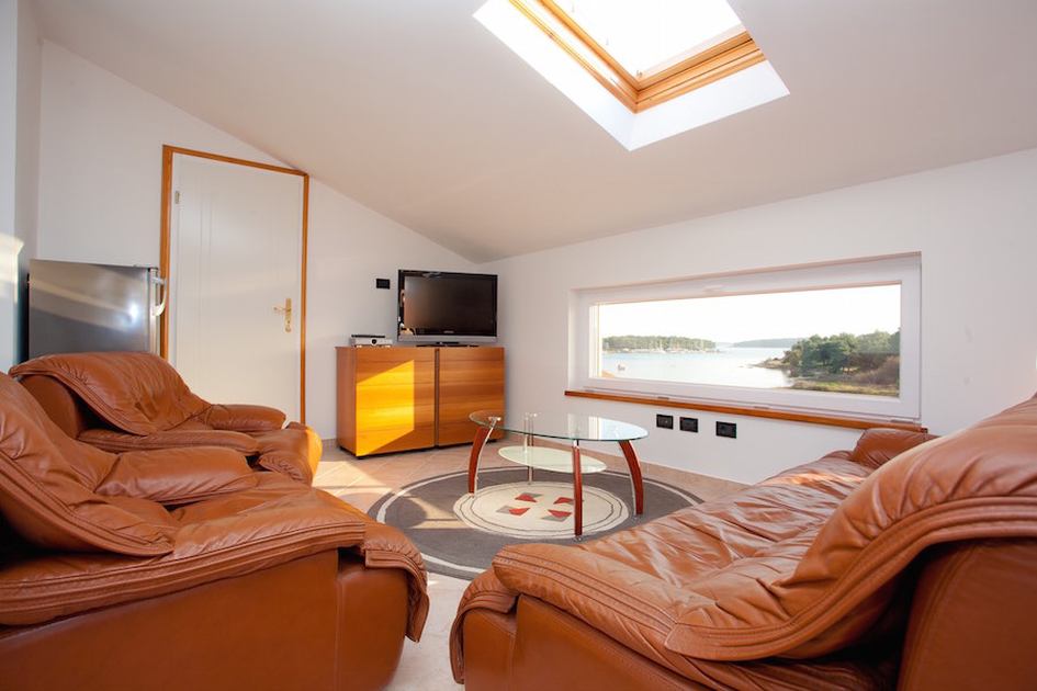 Apartman a villában a legfelső emeleten.